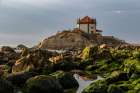 Capela do Senhor da Pedra Chapel on the beach near Porto, Portugal Art Print